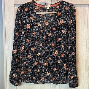 Chic Navy and White Polka Dot Blouse with Floral Design
